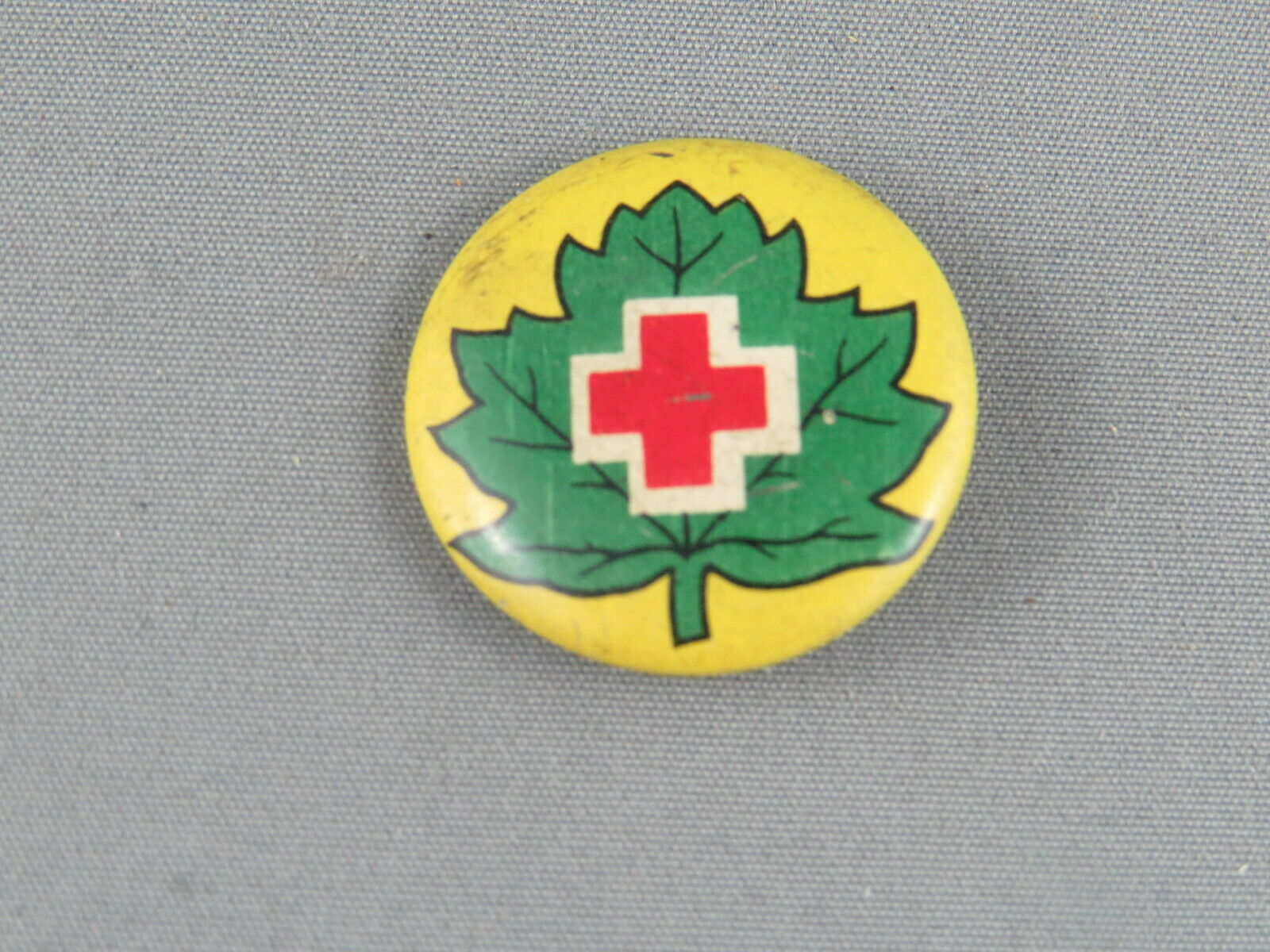 Vintage Red Cross Pin - Logo On Green Leaf